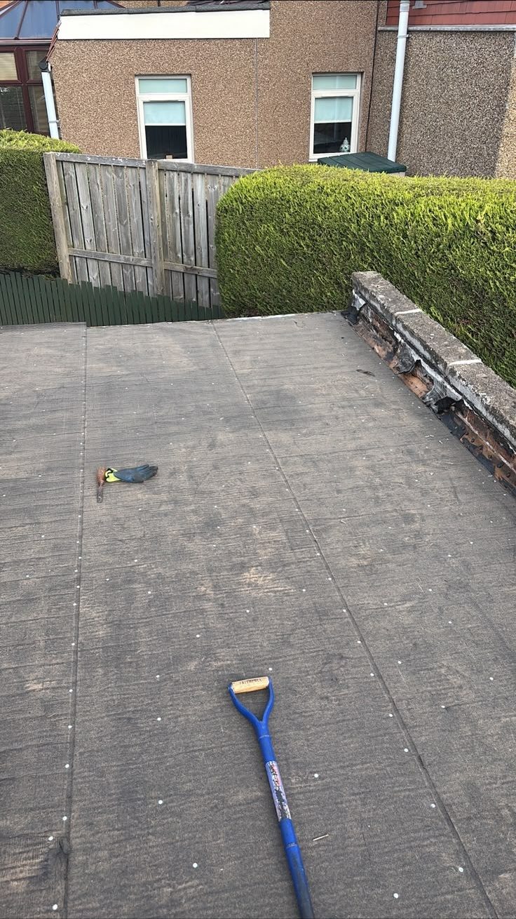 Worn flat roof before re-felting, Edinburgh