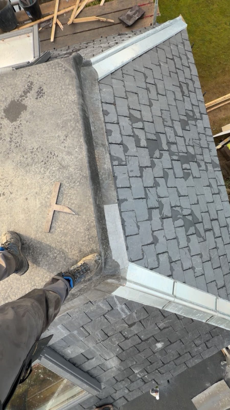 New lead flashing around a dormer on a slate roof, Edinburgh