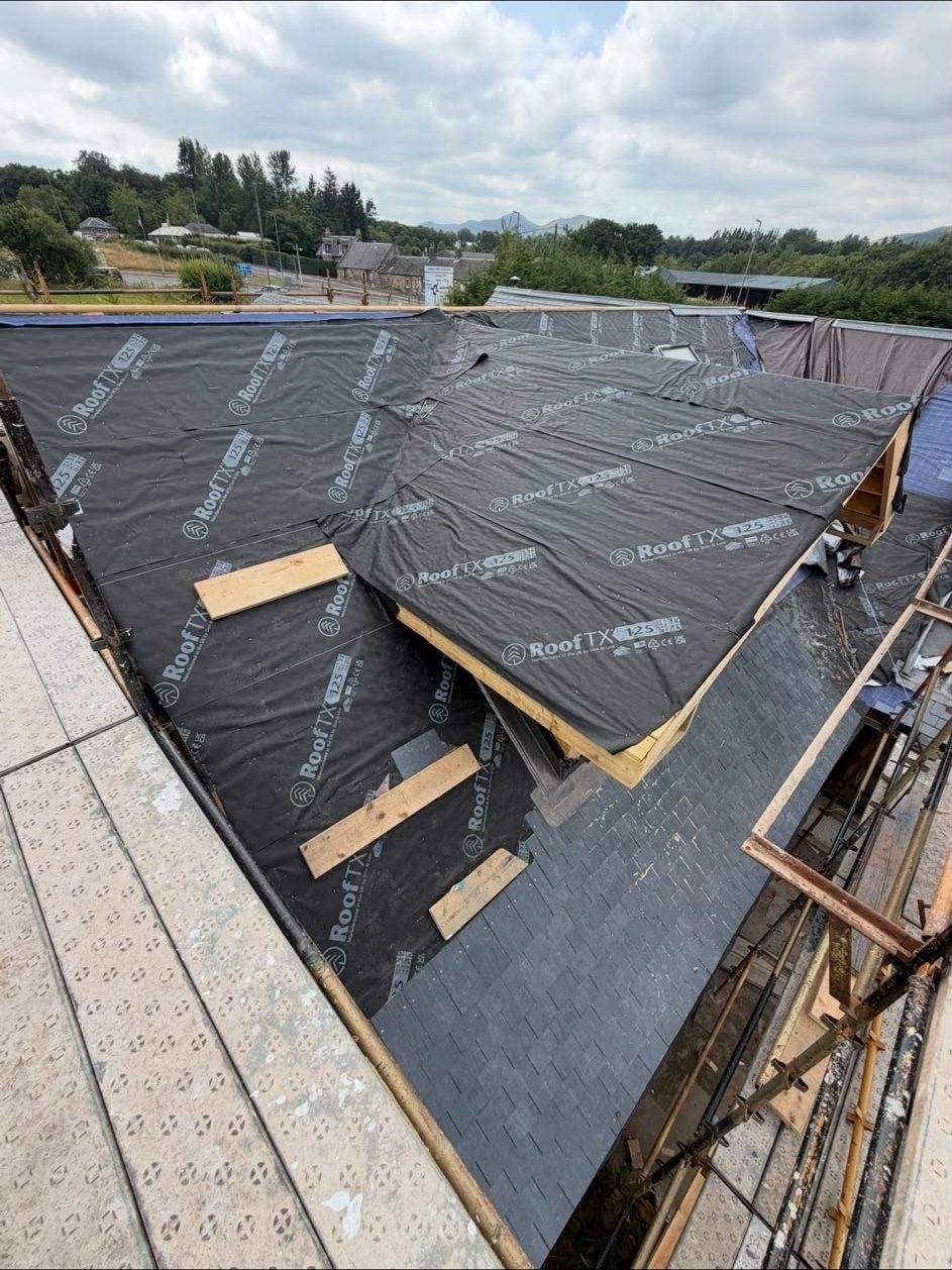 Roof stripped and covered in new membrane during a full re-roof near Edinburgh