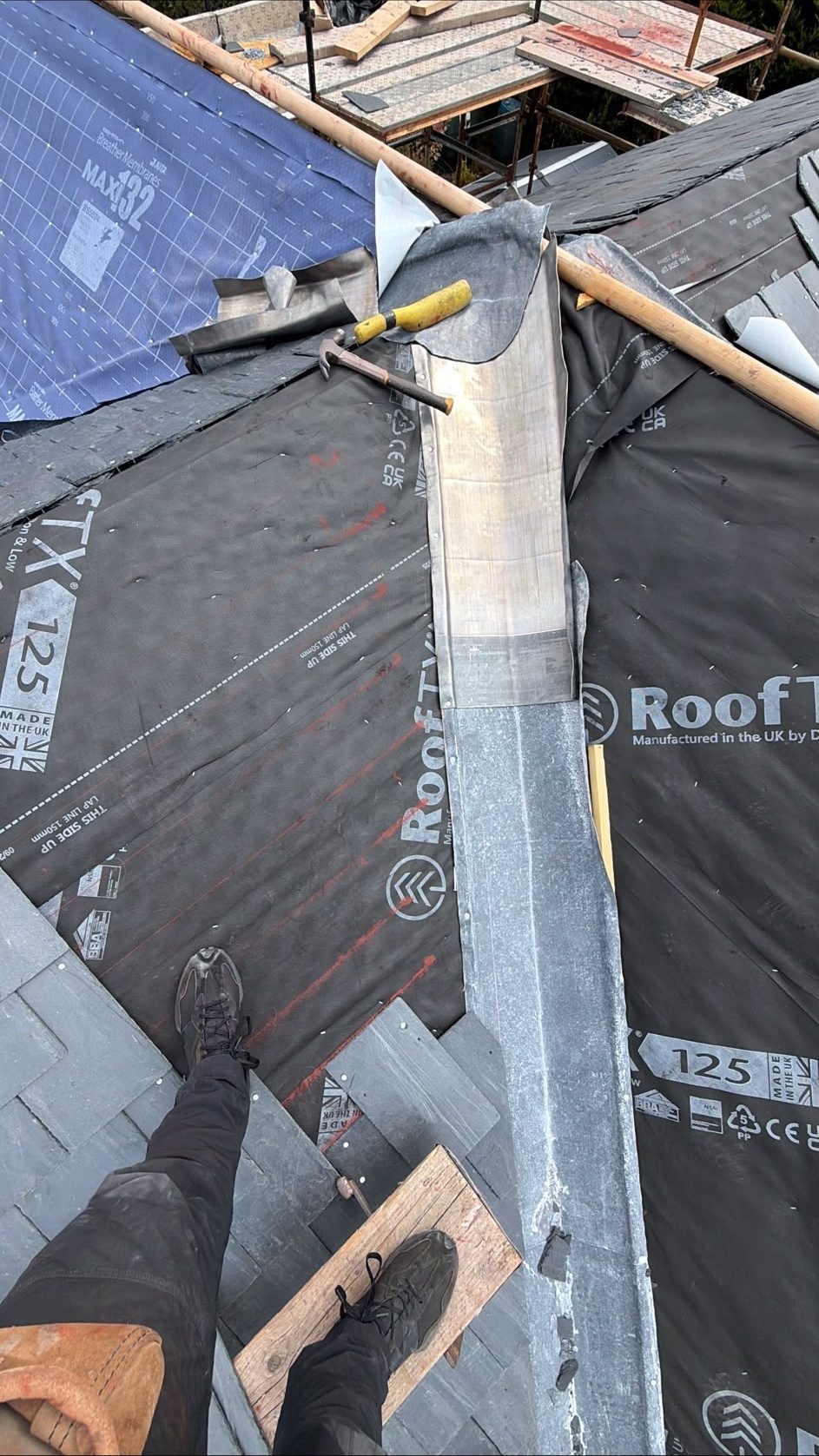 New lead valley being fitted on a re-roof, Edinburgh