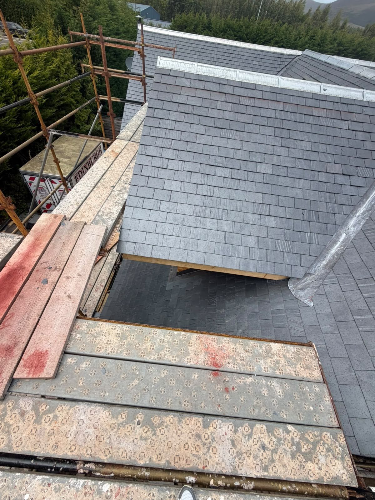 New slating around a dormer, Edinburgh