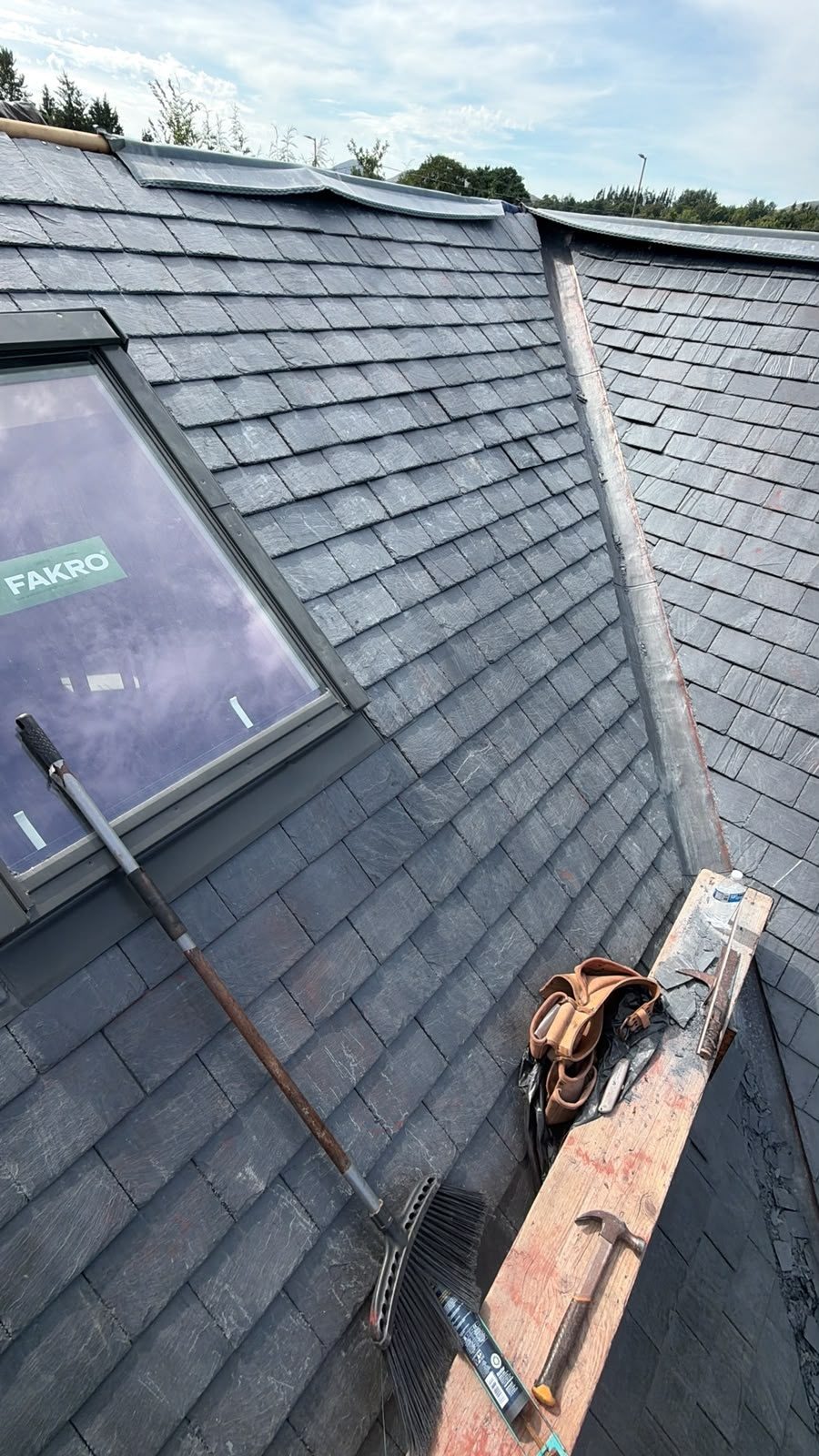 Slate roof with a lead valley and roof window, Edinburgh