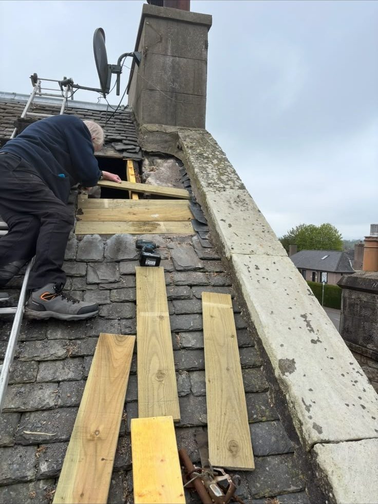 New sarking boards fitted during a slate roof repair, Edinburgh