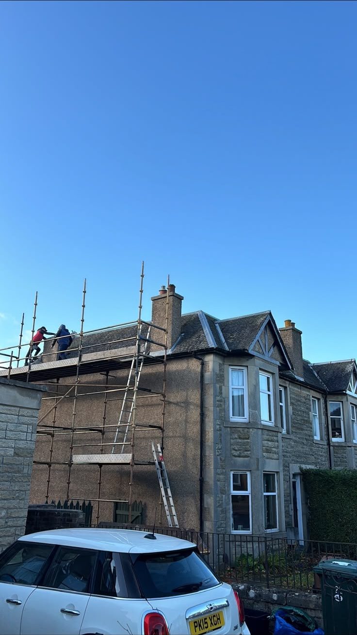 Scaffold up for rendering work on a stone house in Edinburgh